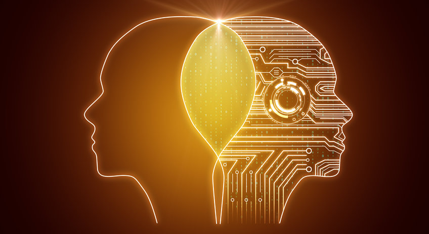 In this picture, two heads are schematically shown overlapping. One of the heads is filled with circuits. A symbolic image for artificial intelligence.