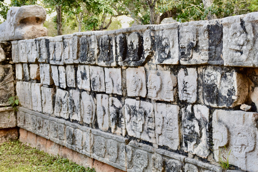 Portion of reconstructed stone tzompantli, or skull rack, at Chichén Itzá.