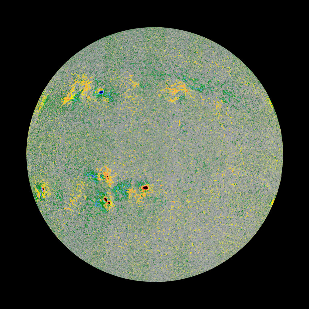 Disc with yellow and green spots